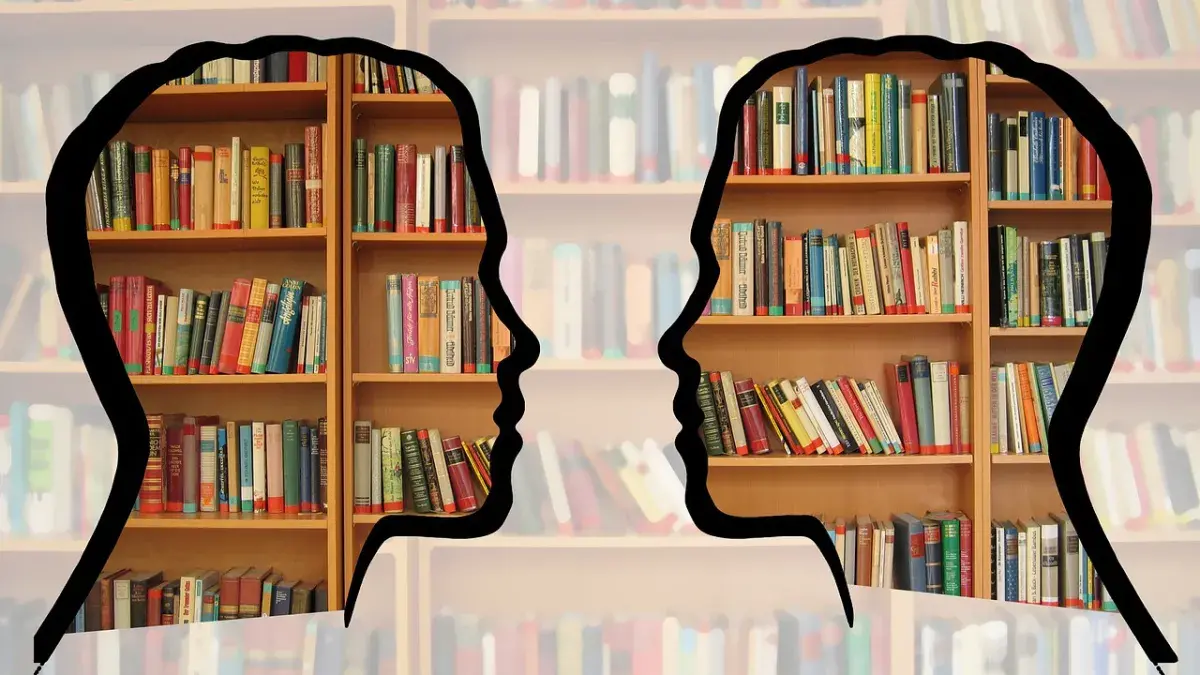Two silouetted heads talking