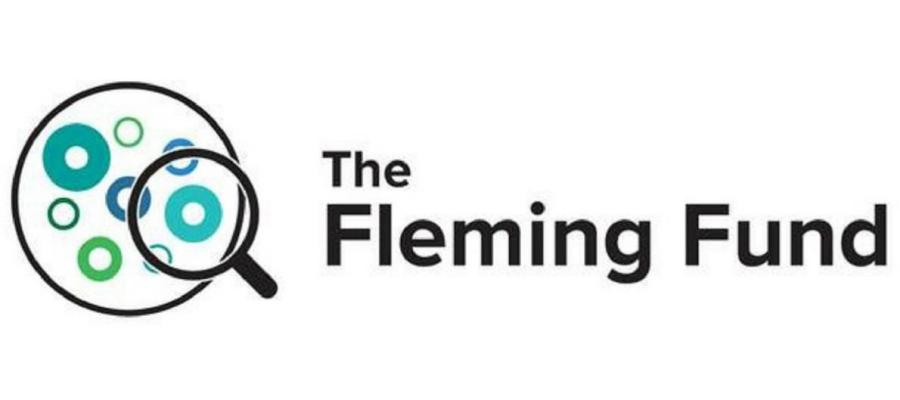 logo for the Fleming Fund, which resembles a magnifying glass looking at some cells on a microscope slide