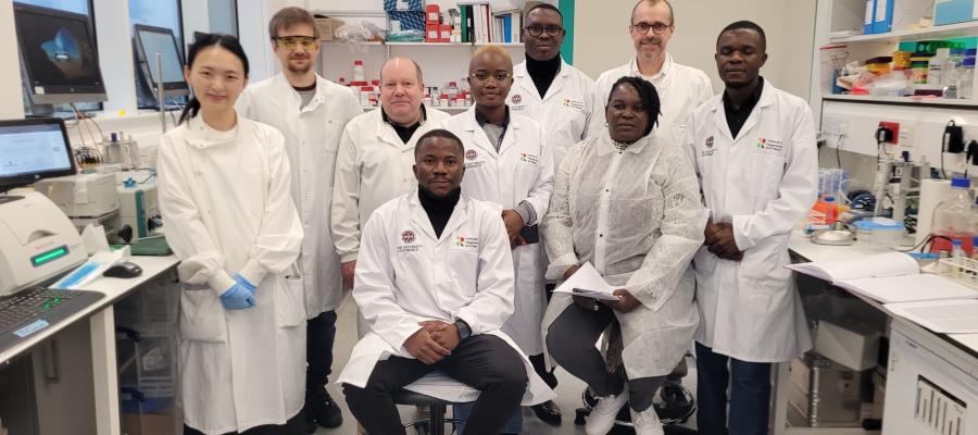 Fleming Fund Fellows on a tour of a lab