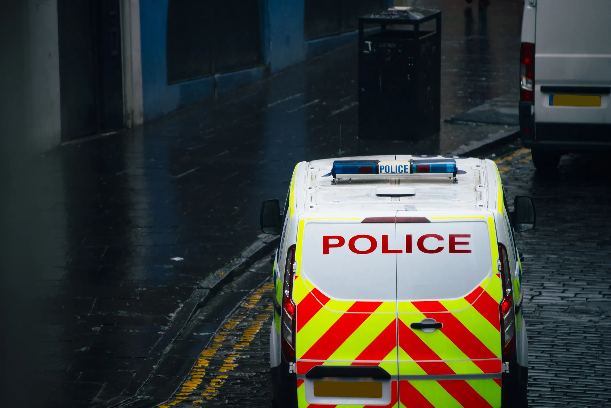 A UK polive car on an empty road