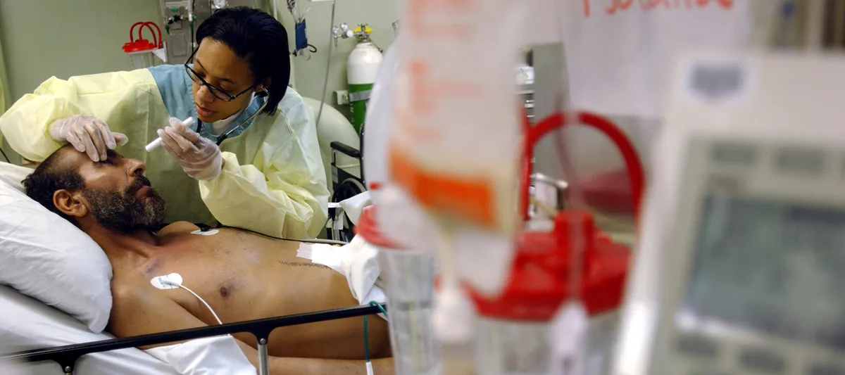 Hospital patient being treat by a nurse