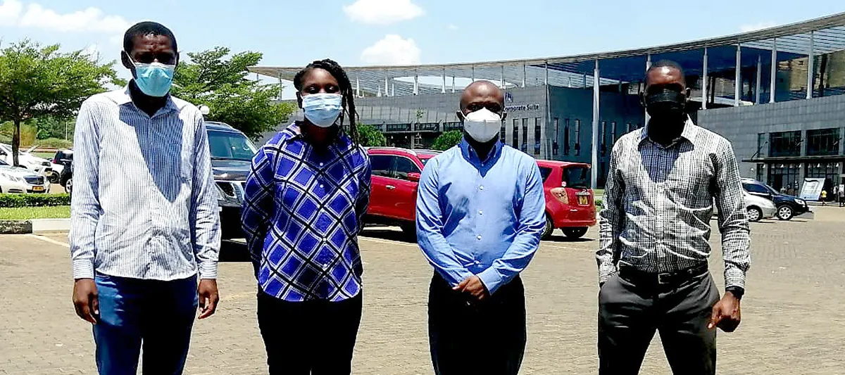 L to R: Mike Luwe, Catherine Kamwana, Dr. Adrian Muwonge (University of Edinburgh), Williams Mwantoma