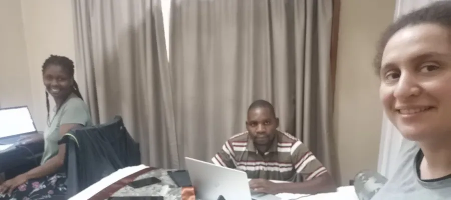 Collaborative Data Cleaning: Catherine Kamwana, Williams Mwantoma, and Dr. Mazeri join forces in Malawi.