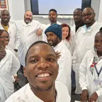 Group of people in lab coats