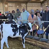 Group of people in a dairy farm