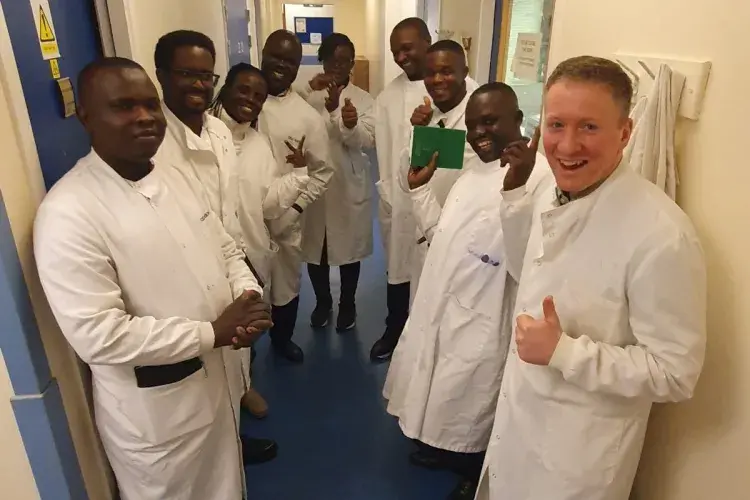 Fleming Fund Fellows on a tour of a lab