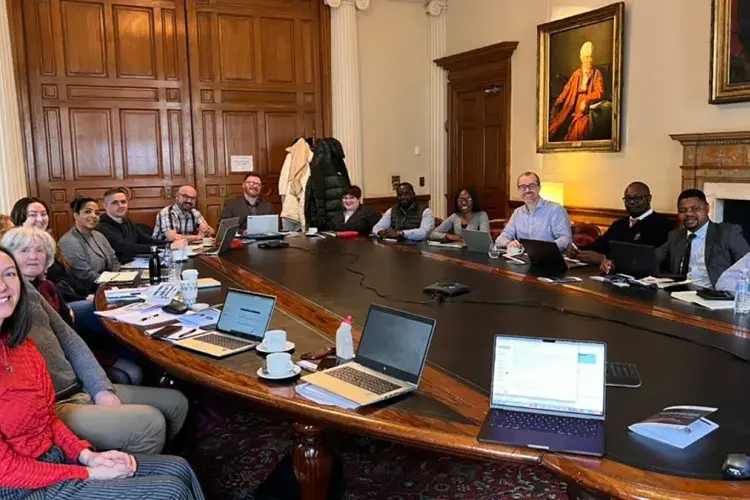 A group round a boardroom table