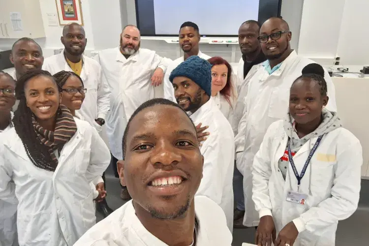 Group of people in lab coats