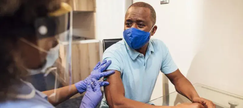 Man receives vaccination 