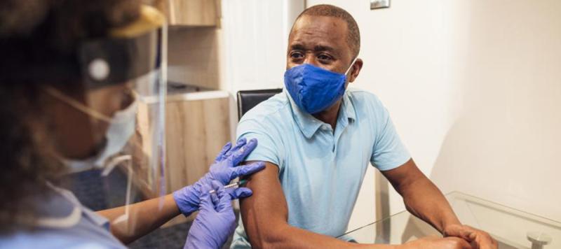 Man receives vaccination 